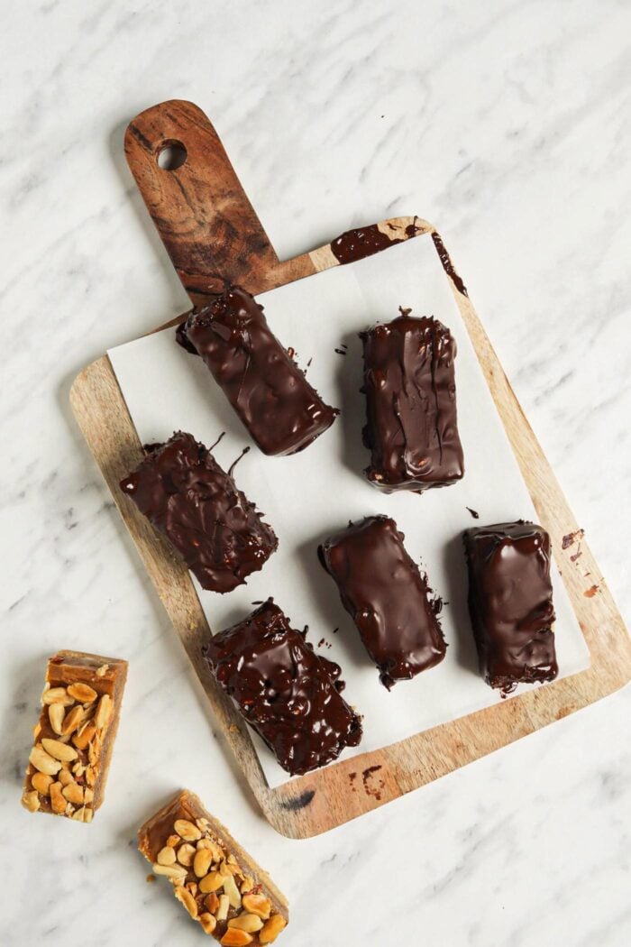 Chocolate candy bars on a cutting board.